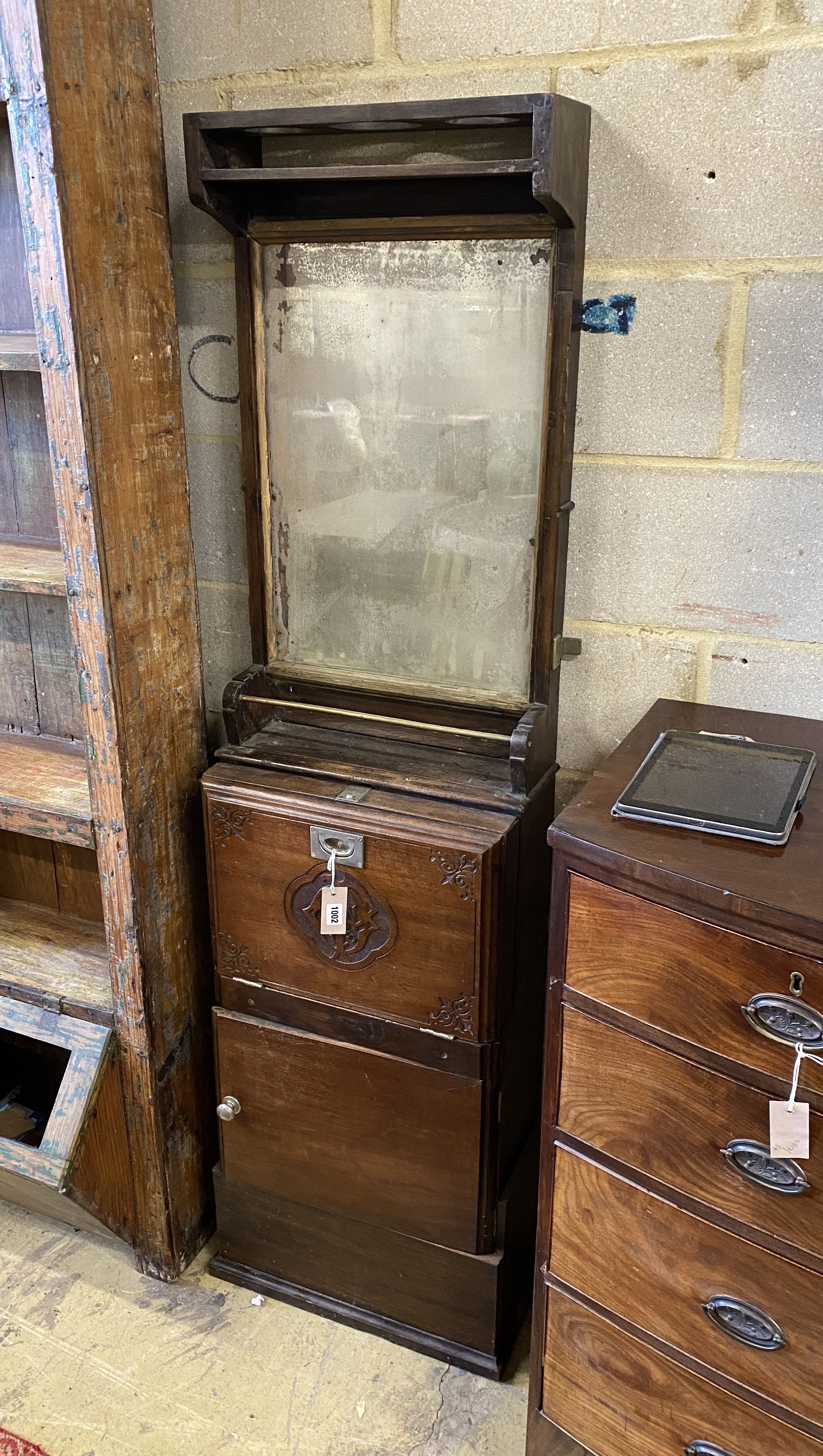 A 19th century P & O southern navigation liner vanity unit, width 48cm, depth 24cm, height 177cm